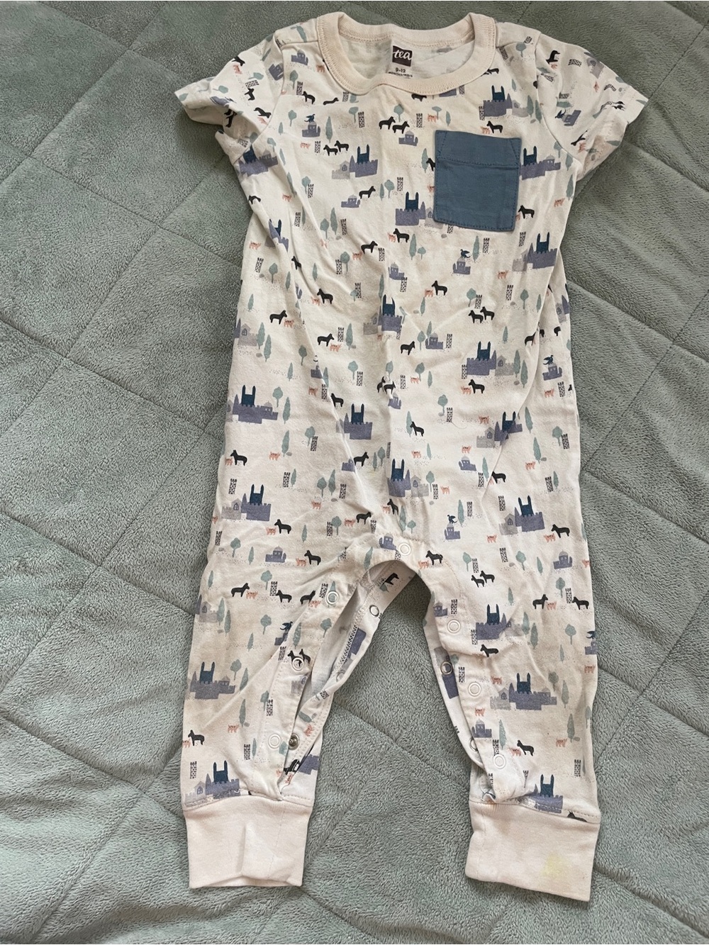 Tea Collection Cream Castle Print One-Piece with Blue Pocket